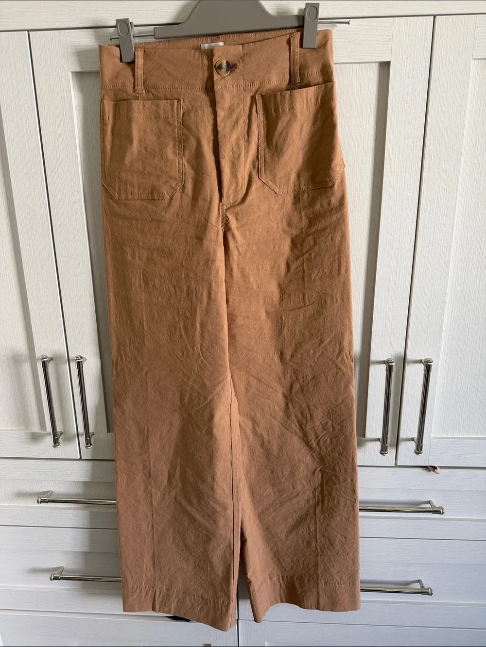Maeve Colette in Tan